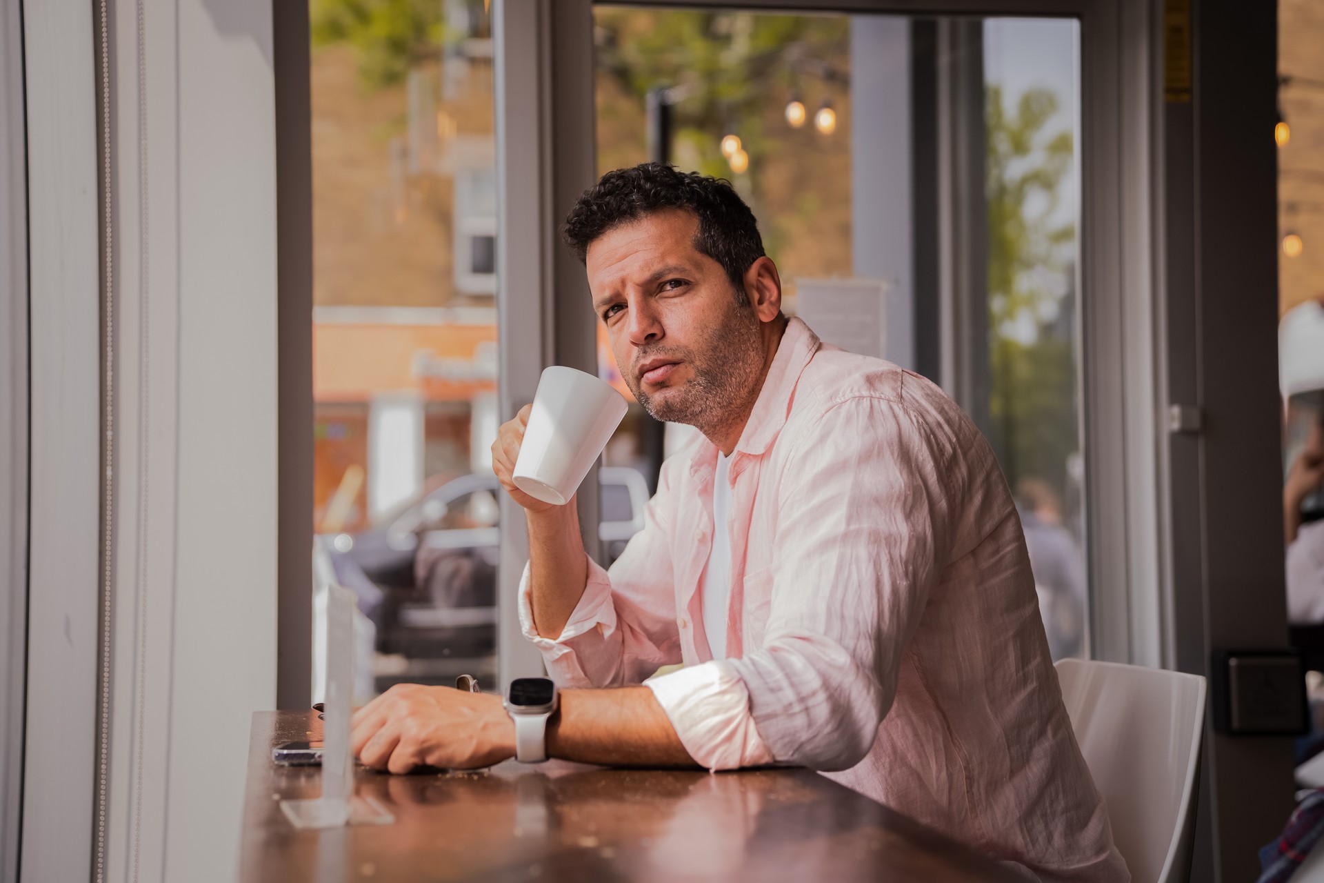 Potrait of a young businessman wearing smart watch